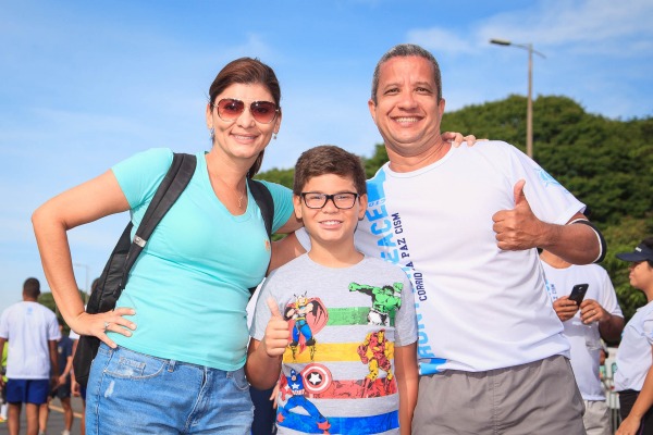 Flávia com o filho Guilherme e o esposo Márcio